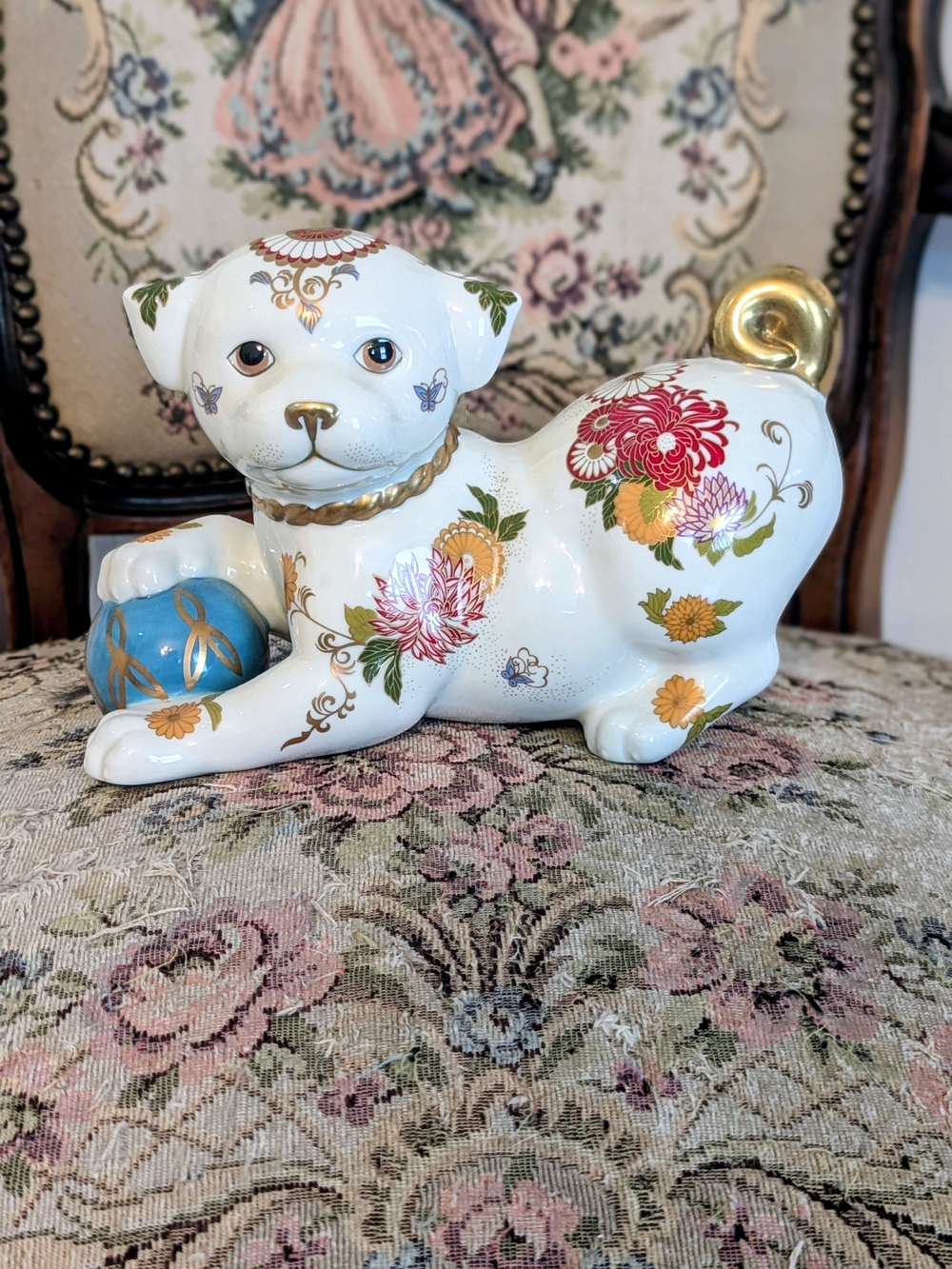 Porcelain Floral Dog Figurine with Blue Ball - Decorative Home Accent